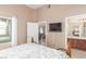 Comfortable bedroom with a view of the living room and bathroom at 8985 S Durango Dr # 2047, Las Vegas, NV 89113