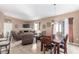 Bright dining area with table and chairs, adjacent to living room at 8985 S Durango Dr # 2047, Las Vegas, NV 89113