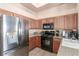 Modern kitchen with stainless steel appliances and granite counters at 8985 S Durango Dr # 2047, Las Vegas, NV 89113