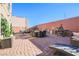 Outdoor kitchen and patio furniture in a spacious backyard at 9045 Knots Estate St, Las Vegas, NV 89139