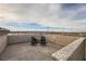 Private rooftop deck with chairs and city views at 9045 Knots Estate St, Las Vegas, NV 89139