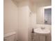 Simple bathroom with a pedestal sink and toilet at 9131 Hitmaker St, Las Vegas, NV 89113