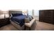 Spacious bedroom with plush bedding and ample closet space at 9131 Hitmaker St, Las Vegas, NV 89113