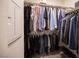 Large walk-in closet with ample hanging space and shelving at 9131 Hitmaker St, Las Vegas, NV 89113