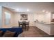 Bright dining area with a four-person table and chairs, adjacent to the kitchen at 9131 Hitmaker St, Las Vegas, NV 89113