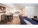 Kitchen and dining area with gray table and chairs at 9131 Hitmaker St, Las Vegas, NV 89113