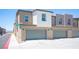 Attached two-car garage with gray doors at 9131 Hitmaker St, Las Vegas, NV 89113