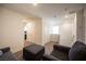 Spacious hallway with sitting area and access to bedrooms at 9131 Hitmaker St, Las Vegas, NV 89113