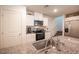 Kitchen with granite countertops, stainless steel appliances, and island sink at 9131 Hitmaker St, Las Vegas, NV 89113