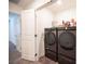 Convenient laundry room with washer and dryer included at 9131 Hitmaker St, Las Vegas, NV 89113