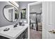 Stylish bathroom features a modern vanity and a view of the stairway at 9131 Sangria Ln, Las Vegas, NV 89147