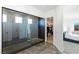 Spa-like bathroom with walk-in shower and mirrored walls at 9525 Ponderay Ct, Las Vegas, NV 89149