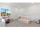 Bright bedroom with a built-in bed and a window seat at 9525 Ponderay Ct, Las Vegas, NV 89149