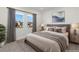 Spacious bedroom with large bed, neutral decor, and natural light at 9525 Ponderay Ct, Las Vegas, NV 89149