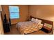 Comfortable bedroom with a queen-size bed and large window at 9975 Peace Way # 2089, Las Vegas, NV 89147