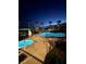 Night view of sparkling pool and relaxing spa at 9975 Peace Way # 2089, Las Vegas, NV 89147