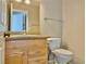 Bathroom with wood vanity and toilet at 100 S Crestline Dr # 57, Las Vegas, NV 89107