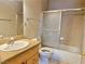 Bathroom with shower/tub combo and wood vanity at 100 S Crestline Dr # 57, Las Vegas, NV 89107