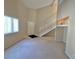 Living area featuring a staircase and front entrance at 100 S Crestline Dr # 57, Las Vegas, NV 89107