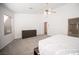 Main bedroom with a dresser and access to the ensuite bathroom at 10009 Dusty Winds Ave, Las Vegas, NV 89117