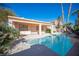 Inviting swimming pool with a spa and covered patio at 10009 Dusty Winds Ave, Las Vegas, NV 89117