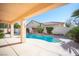 Relaxing pool area with a covered patio at 10009 Dusty Winds Ave, Las Vegas, NV 89117