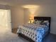 Spacious bedroom with modern decor and access to upper loft at 10411 Rose Palisade St, Las Vegas, NV 89141