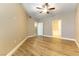 Spacious bedroom featuring hardwood floors and a ceiling fan at 10550 W Alexander Rd # 1156, Las Vegas, NV 89129