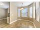 Bright dining area with bay window and light flooring at 10550 W Alexander Rd # 1156, Las Vegas, NV 89129