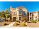 Two-story townhome with attractive facade and landscaping at 10550 W Alexander Rd # 1156, Las Vegas, NV 89129