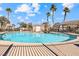 Inviting kidney-shaped community pool with surrounding lounge chairs at 1086 Sheer Paradise Ln # 101, Henderson, NV 89002