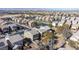 Aerial view of a house and neighborhood, showcasing surrounding homes and landscape at 1112 Via Monticano, Henderson, NV 89052