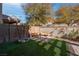 Landscaped backyard with seating area and artificial turf at 1112 Via Monticano, Henderson, NV 89052