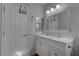 Bathroom with white vanity and decorative mirror at 1112 Via Monticano, Henderson, NV 89052