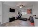 Home gym with treadmill, weights, and exercise ball at 1112 Via Monticano, Henderson, NV 89052