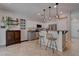 Modern kitchen with stainless steel appliances and an island at 1112 Via Monticano, Henderson, NV 89052