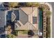 Two-story house with a pool and solar panels, seen from an overhead angle at 1137 Glistening Point Ave, Henderson, NV 89015