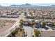 House nestled in a quiet residential neighborhood with mountain views at 1137 Glistening Point Ave, Henderson, NV 89015