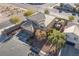 Two-story house with a backyard pool and solar panels, seen from above at 1137 Glistening Point Ave, Henderson, NV 89015