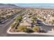 Two-story house with a pool and solar panels in a residential area at 1137 Glistening Point Ave, Henderson, NV 89015