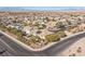 Two-story house with solar panels and a backyard, in a residential area at 1137 Glistening Point Ave, Henderson, NV 89015