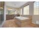 Bathroom with large soaking tub and double vanity at 1137 Glistening Point Ave, Henderson, NV 89015