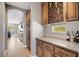 Butlers pantry with wine rack and granite countertop at 1137 Glistening Point Ave, Henderson, NV 89015