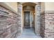 Inviting entryway with a decorative door and stone accents at 1137 Glistening Point Ave, Henderson, NV 89015