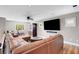 Loft with sectional sofa and large TV at 1137 Glistening Point Ave, Henderson, NV 89015