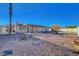 Large backyard with gravel landscaping and a swimming pool at 1401 S 17Th St, Las Vegas, NV 89104