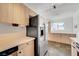 Modern kitchen with stainless steel appliances and light wood cabinets at 1401 S 17Th St, Las Vegas, NV 89104