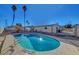 Inviting kidney-shaped pool in the backyard at 1401 S 17Th St, Las Vegas, NV 89104