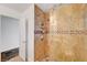 Walk-in shower with pebble flooring and glass enclosure at 1401 S 17Th St, Las Vegas, NV 89104