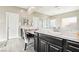 Spa-like bathroom with double vanity and large mirror at 1557 Mistywood Ct, Henderson, NV 89014